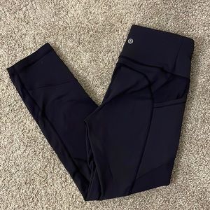 Navy lululemon 7/8 length leggings, size 8.